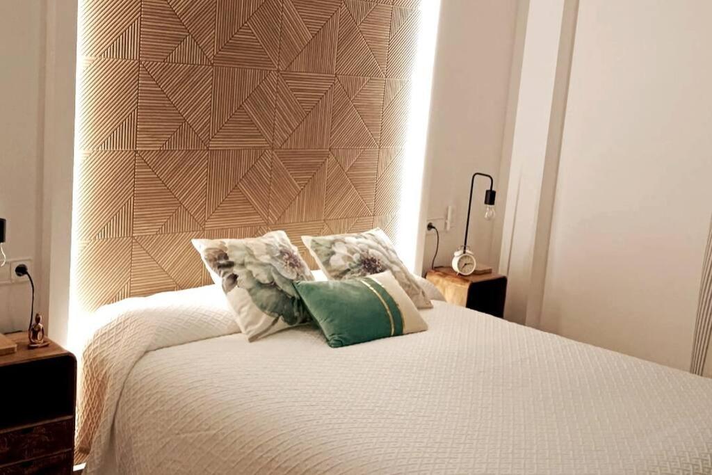 Кровать или кровати в номере Apartamento Bayyana