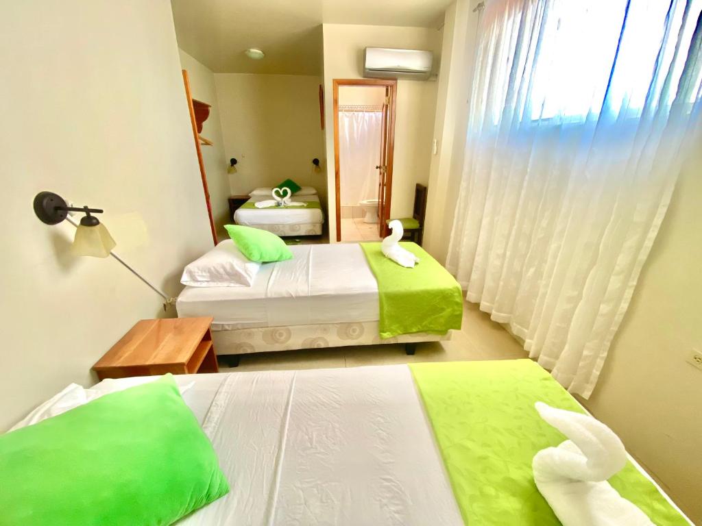 Postel nebo postele na pokoji v ubytování El Rincón de George