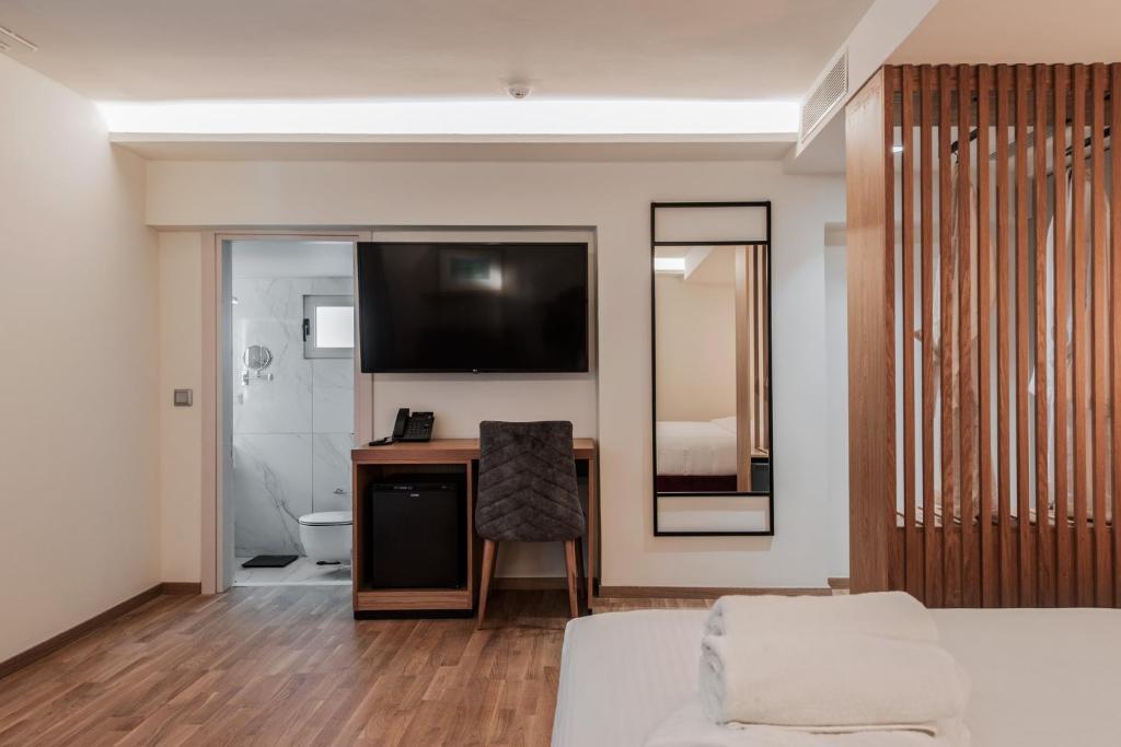 TV a/nebo společenská místnost v ubytování Urban Frame Acropolis