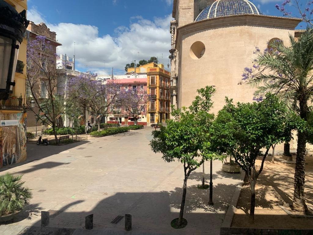 a city street with trees and a building at Valencia Old Town EL CARMEN. in Valencia