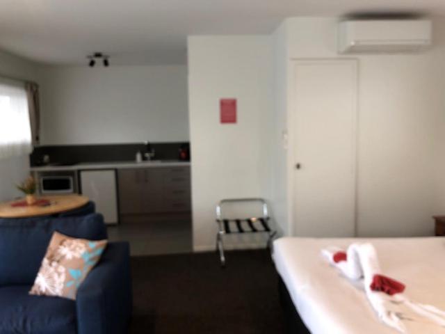 Kuchyň nebo kuchyňský kout v ubytování Coachman Motel