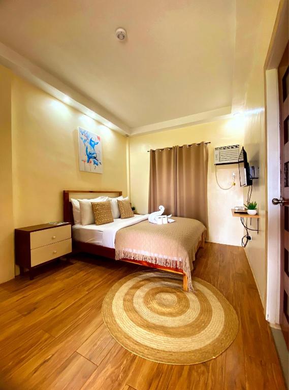 Postel nebo postele na pokoji v ubytování Villa Alessandra Homestay