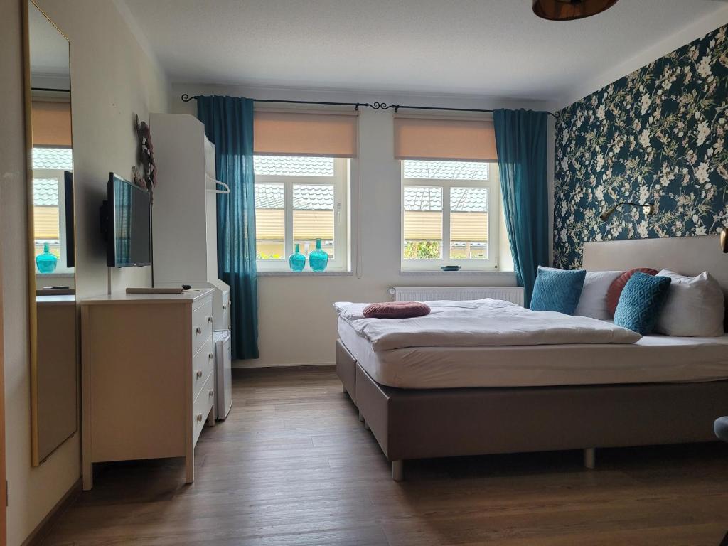 Postel nebo postele na pokoji v ubytování Pension Lavida Usedom