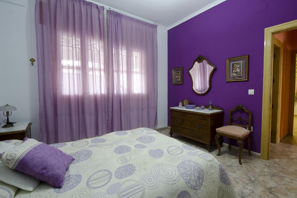 A bed or beds in a room at Villa Frasquita