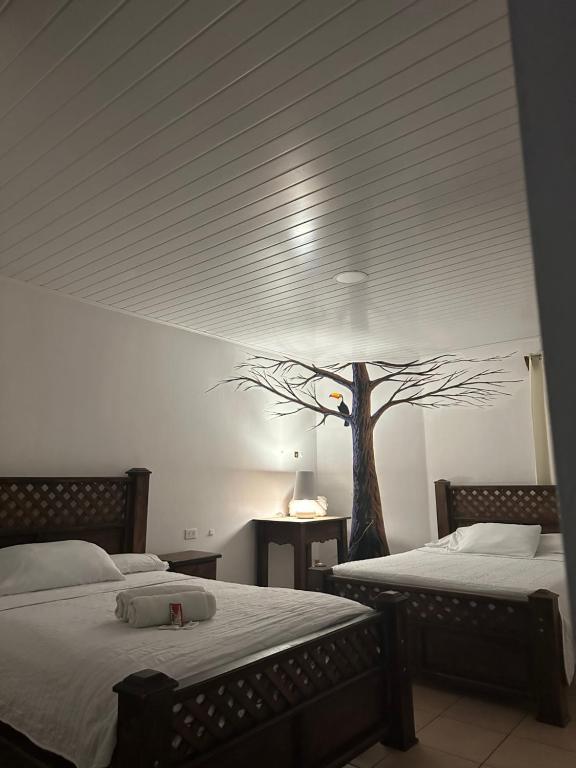 Hotel Pacande B&Bにあるベッド
