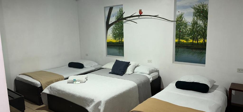 Hotel Pacande B&Bにあるベッド