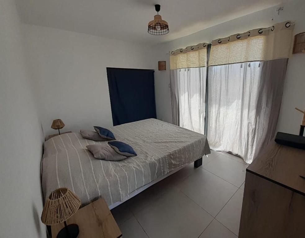 Postel nebo postele na pokoji v ubytování Vacances entre mer et colline