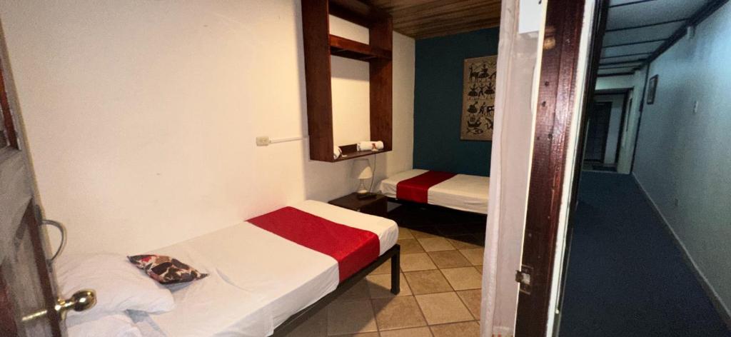 Hotel Pacande B&Bにあるベッド