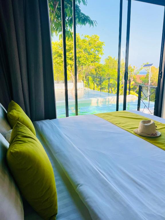 Postel nebo postele na pokoji v ubytování Pahili Pool Villas Koh Tao - SHA Plus