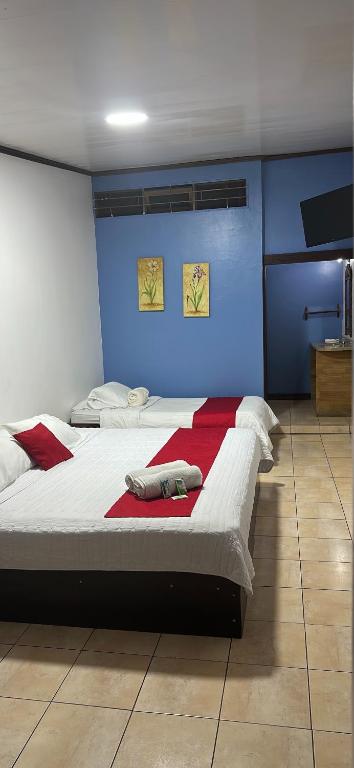 Hotel Pacande B&Bにあるベッド