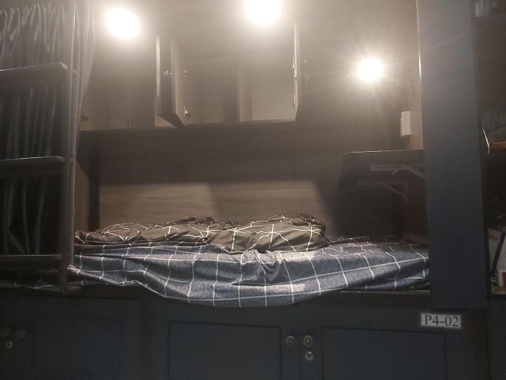 Postel nebo postele na pokoji v ubytování HOMSTAY 1106 QUANG TRUNG