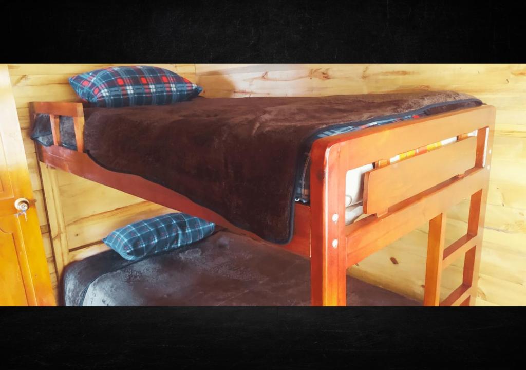 Palanda nebo palandy na pokoji v ubytování Cozy cabin Casa Enya