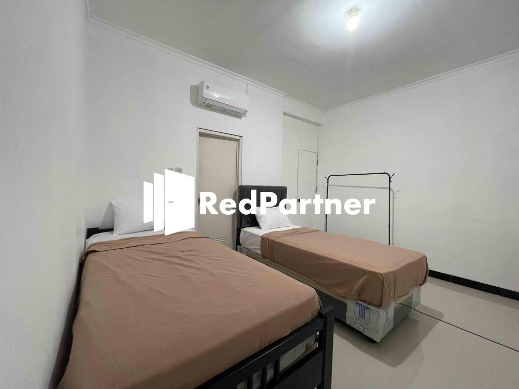 Hotel Pusponjolo Syariah Semarang Mitra RedDoorz - Deluxe Room