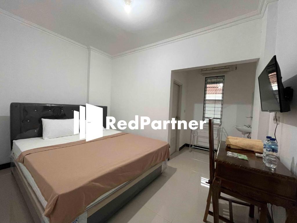Hotel Pusponjolo Syariah Semarang Mitra RedDoorz - Economy Double Room