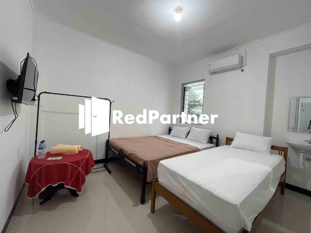 Hotel Pusponjolo Syariah Semarang Mitra RedDoorz - Family Room