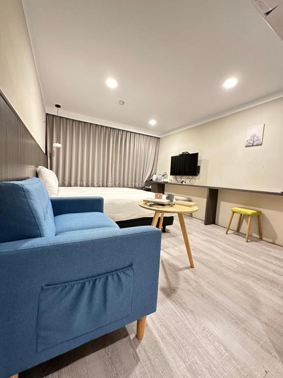 TV a/nebo společenská místnost v ubytování Yoshi Hotel - Tainan Station Branch