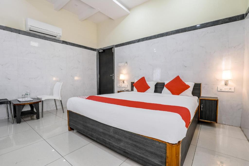 Postel nebo postele na pokoji v ubytování Super Hotel O Src Grand