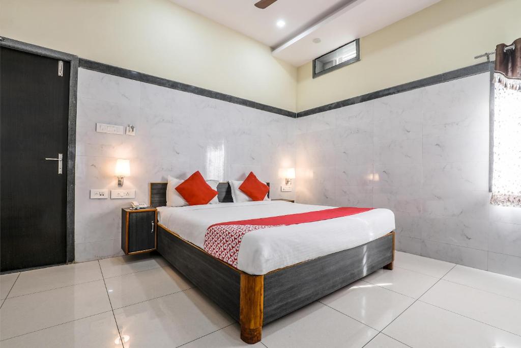 Postel nebo postele na pokoji v ubytování Super Hotel O Src Grand