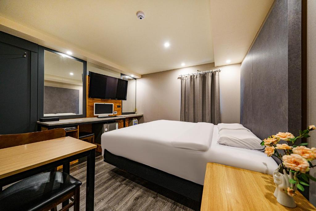 Postel nebo postele na pokoji v ubytování 27 Hotel