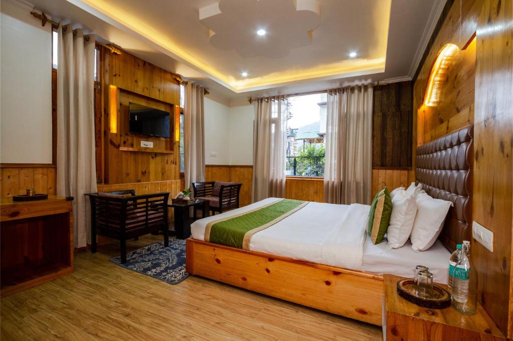 Postel nebo postele na pokoji v ubytování Tripli Hotels Conifer Wood Cottage