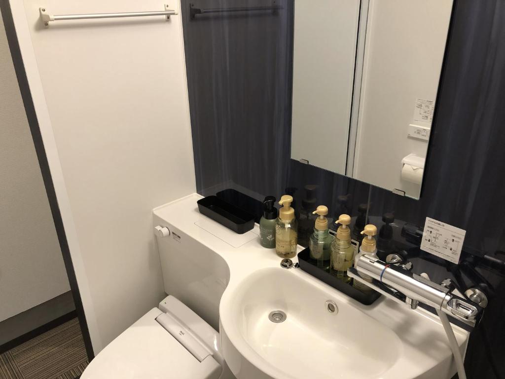 Koupelna v ubytování Hotel Tohko HakataGion