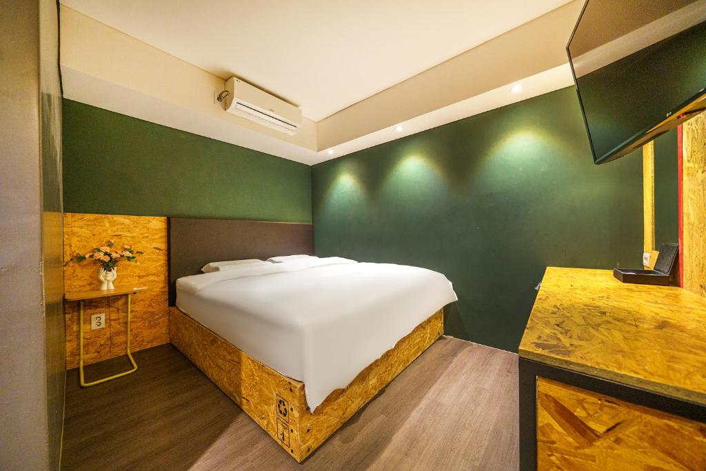 Postel nebo postele na pokoji v ubytování 27 Hotel