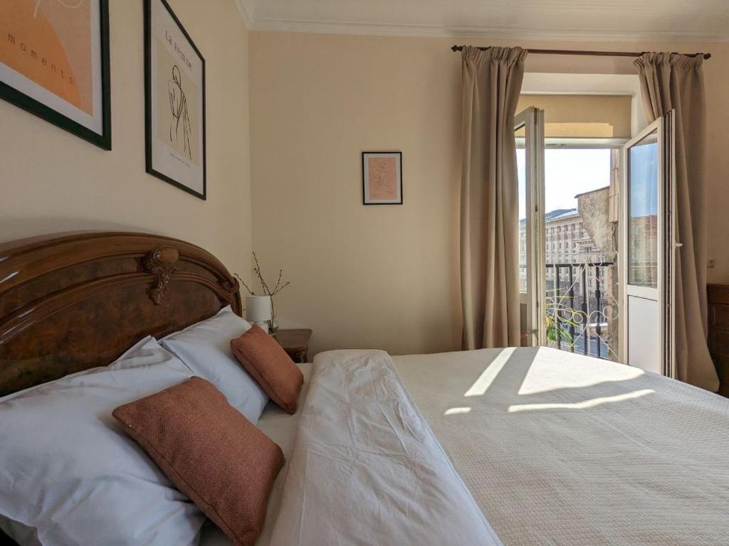 Ένα ή περισσότερα κρεβάτια σε δωμάτιο στο Видова квартира біля метро Хрещатик