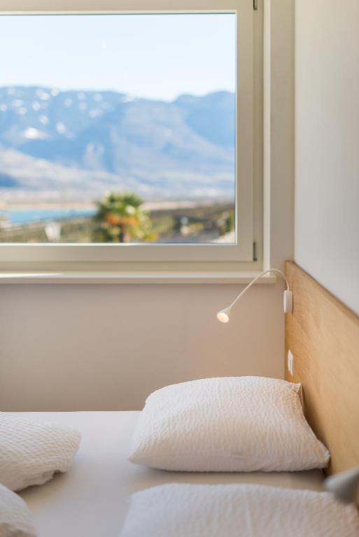 Postel nebo postele na pokoji v ubytování Rösslhof