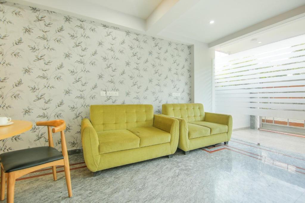 Posezení v ubytování Collection O Corporate Suite Near Omaxe Celebration Mall