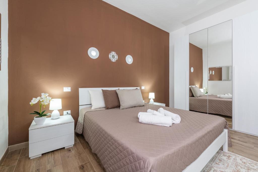 A bed or beds in a room at Villetta Mattia