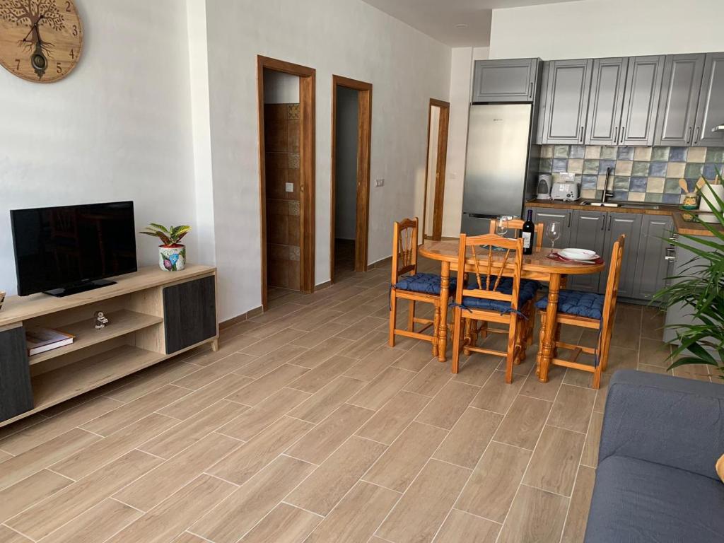TV a/nebo společenská místnost v ubytování Casa Rachel