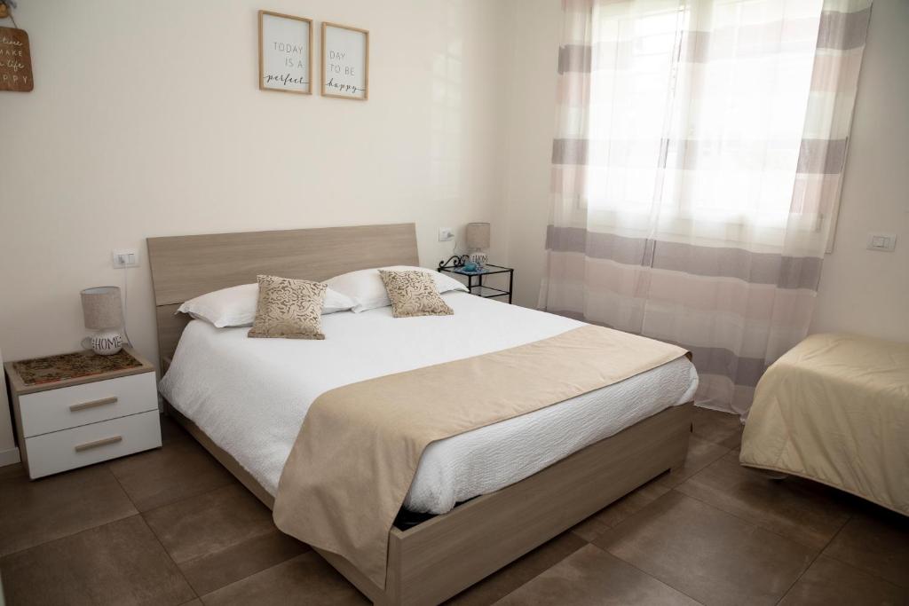 Postel nebo postele na pokoji v ubytování Maisonette Modena Park