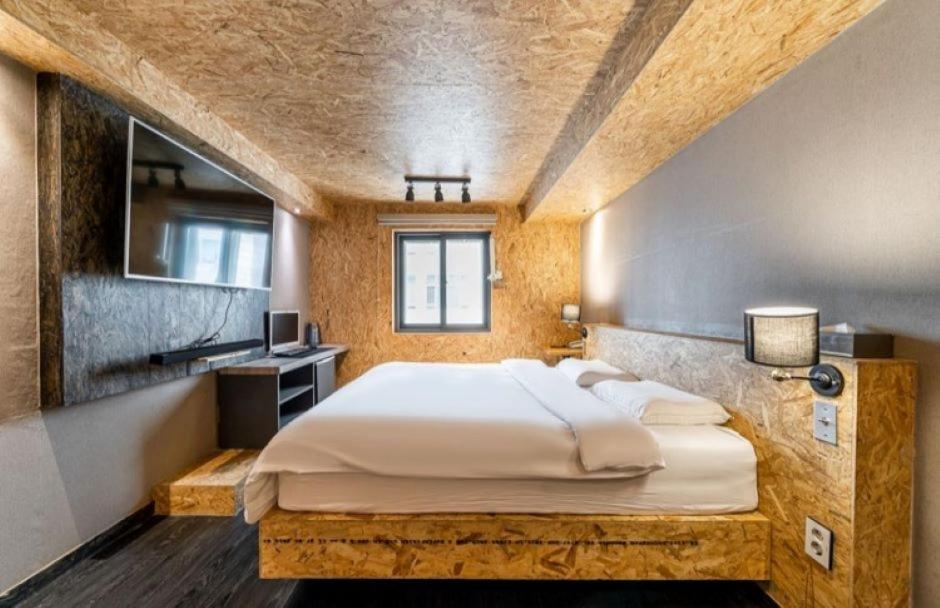 Postel nebo postele na pokoji v ubytování 27 Hotel