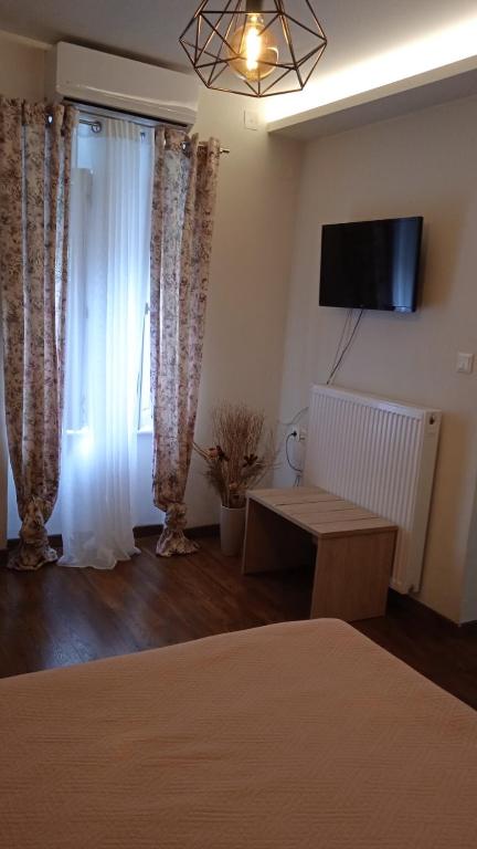 TV a/nebo společenská místnost v ubytování Alkistis House