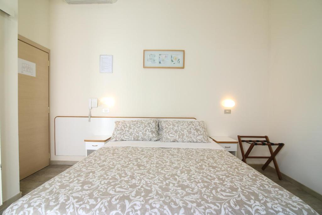 Postel nebo postele na pokoji v ubytování Hotel Soave