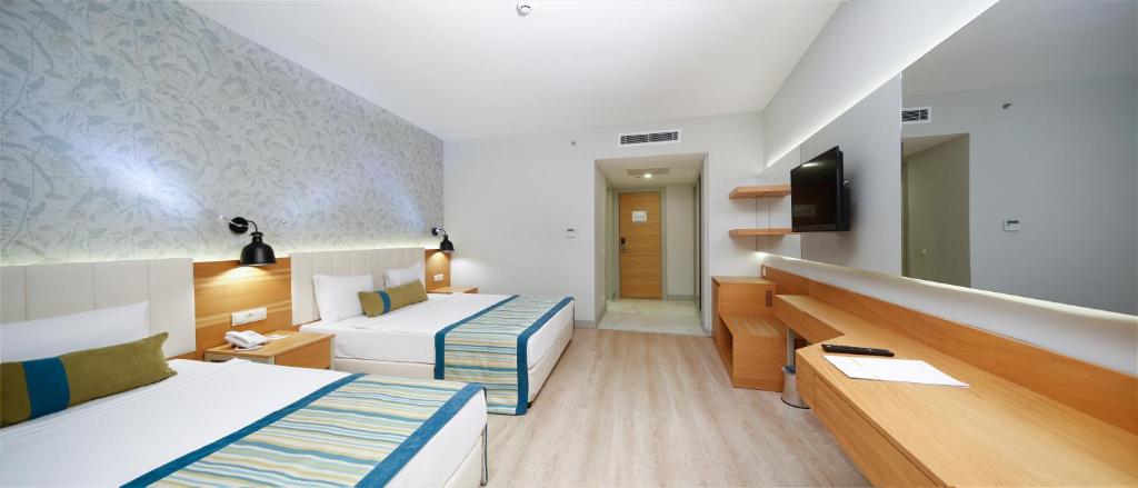 Postel nebo postele na pokoji v ubytování Calido Maris Hotel Ultra All Inclusive
