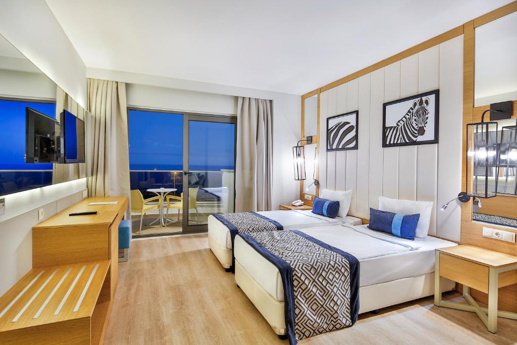 Postel nebo postele na pokoji v ubytování Calido Maris Hotel Ultra All Inclusive