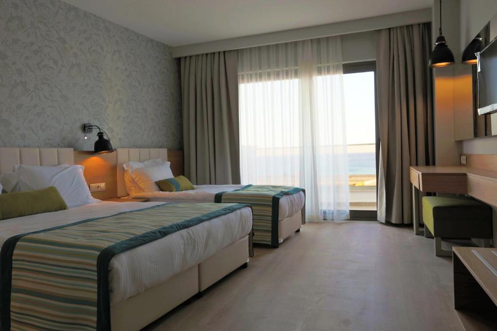 Postel nebo postele na pokoji v ubytování Calido Maris Hotel Ultra All Inclusive
