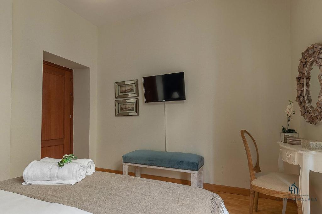 TV a/nebo společenská místnost v ubytování Living4Malaga Álamos 40
