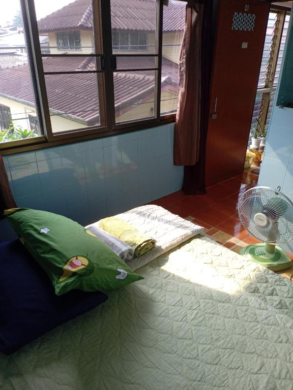 Postel nebo postele na pokoji v ubytování NP guesthouse