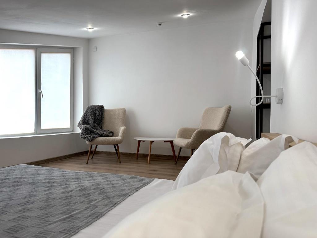 Posezení v ubytování Higina Spa Hotel