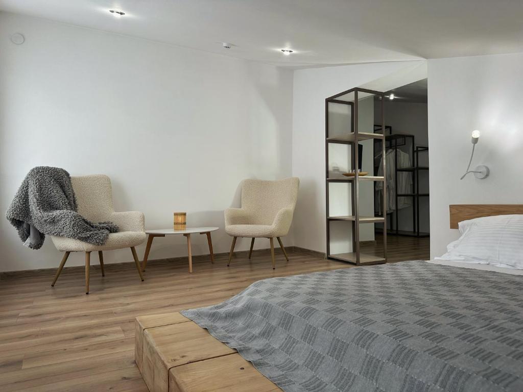 Postel nebo postele na pokoji v ubytování Higina Spa Hotel