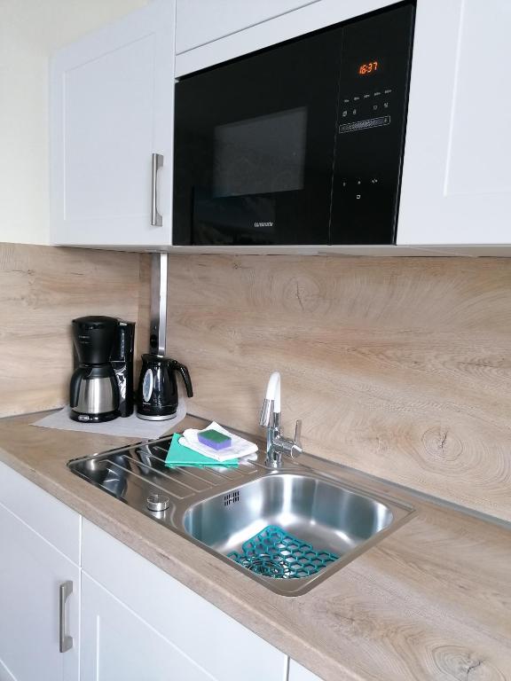 Kuchyň nebo kuchyňský kout v ubytování Ferienwohnung Wegner
