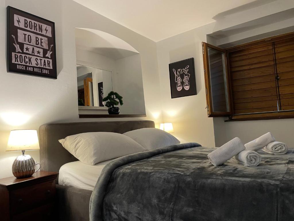 Postel nebo postele na pokoji v ubytování Tequila Apartments
