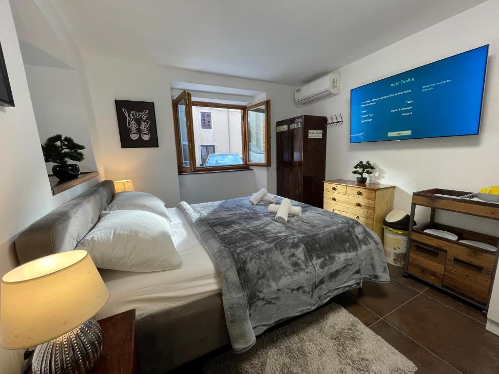 Postel nebo postele na pokoji v ubytování Tequila Apartments