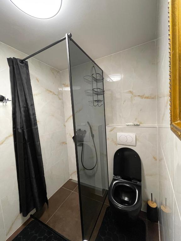 Koupelna v ubytování Tequila Apartments