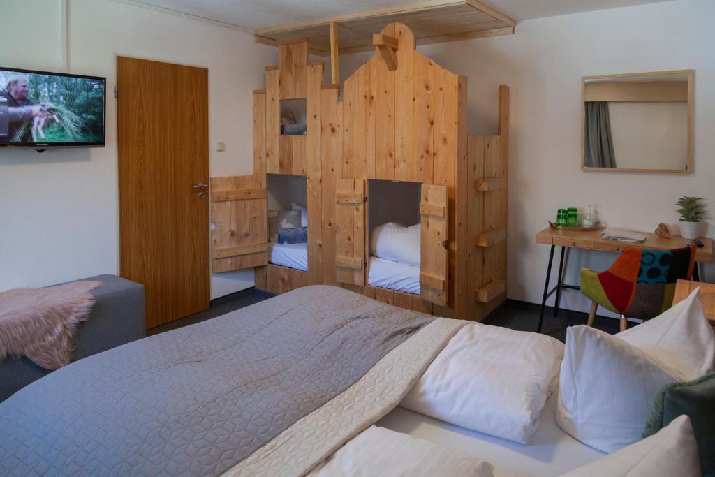 Postel nebo postele na pokoji v ubytování Berghotel TheLounge