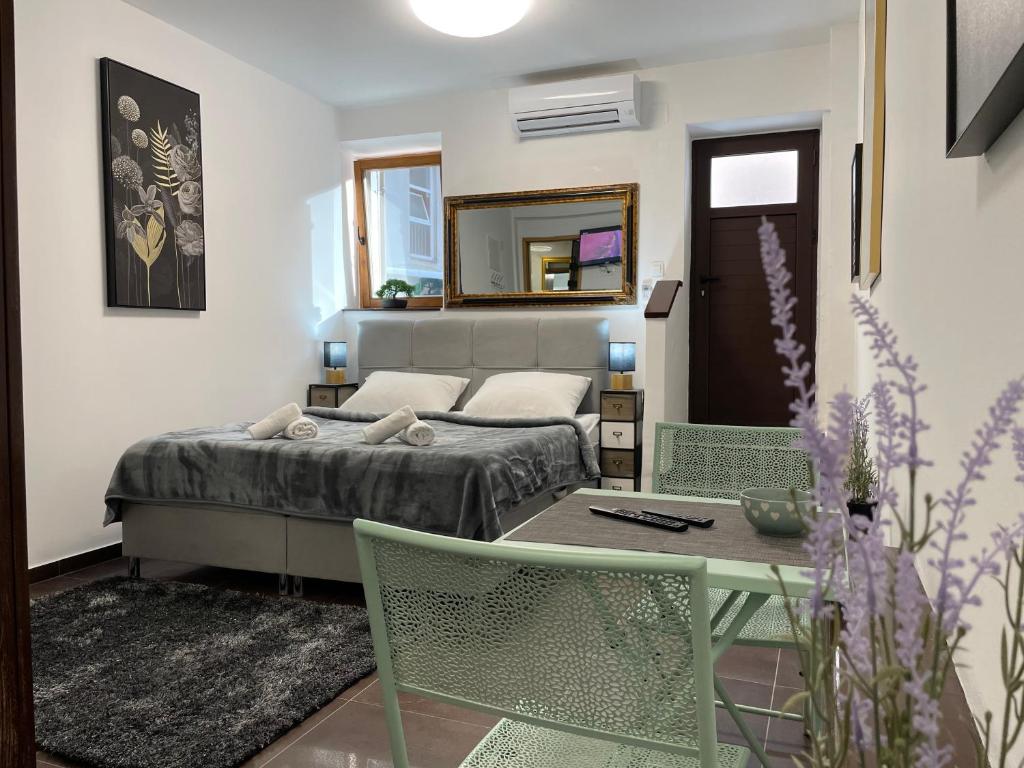 Postel nebo postele na pokoji v ubytování Tequila Apartments