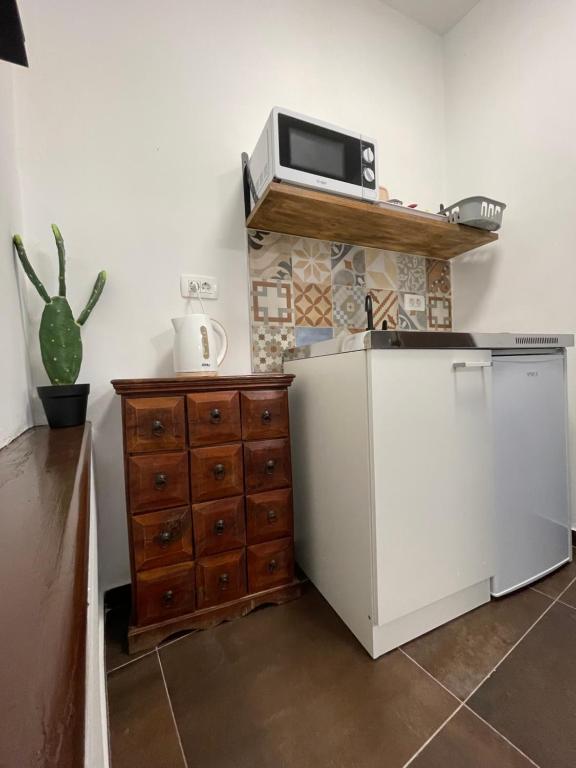 Kuchyň nebo kuchyňský kout v ubytování Tequila Apartments