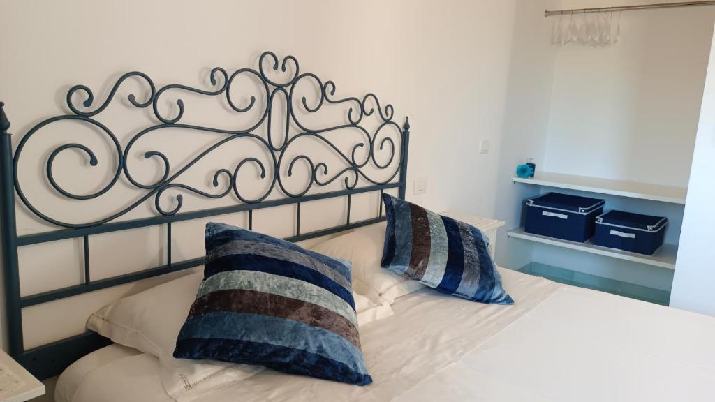 A bed or beds in a room at Audaces Resort